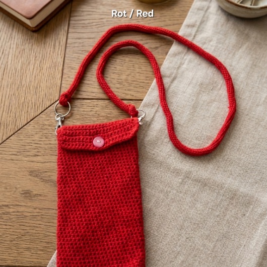 Handgehäkelte Handytasche Gehäkelte Umhängetasche aus hochwertigem Garn mit gleichmäßiger Struktur und Knopfverschluss. Die Tasche misst etwa 12 x 20 cm, bietet Platz für ein Smartphone und kleine Alltagsgegenstände. Mit abnehmbarem Schultergurt, der wahlweise als Umhängetasche oder Handyhülle genutzt werden kann. In verschiedenen Farben erhältlich – ein handgemachtes, stilvolles und nachhaltiges Accessoire.